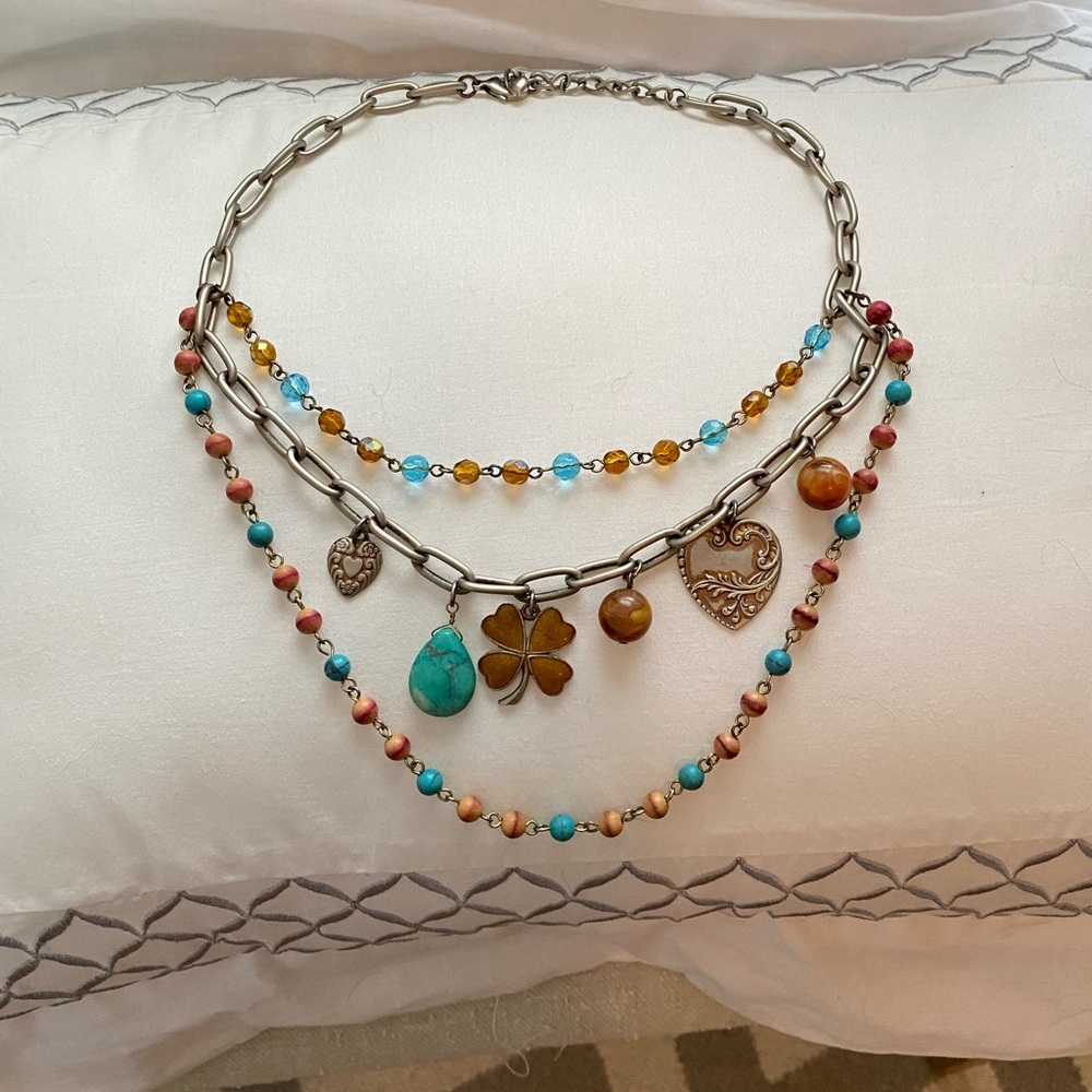 Link, bead and charm statement necklace